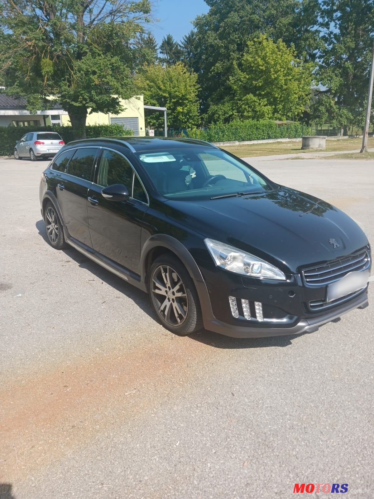 2013' Peugeot 508 Rxhhibrid Sw photo #1