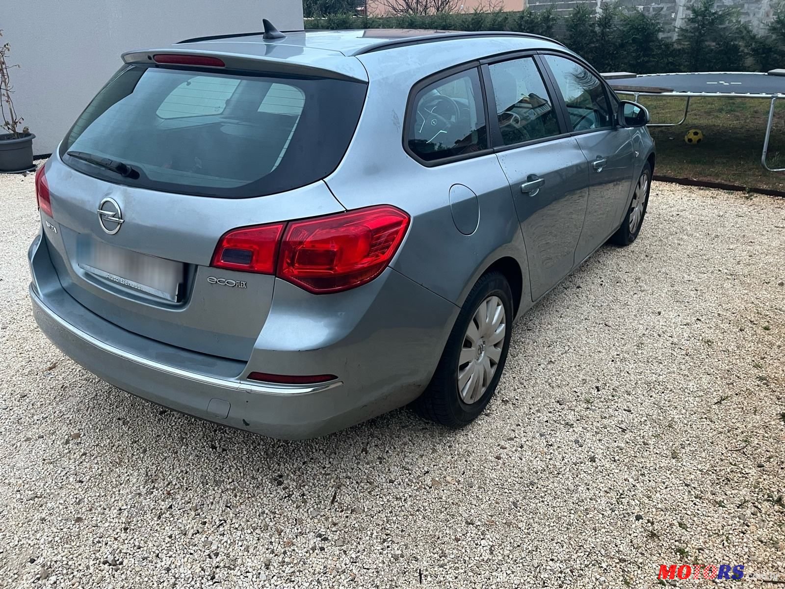 2014' Opel Astra Karavan photo #2