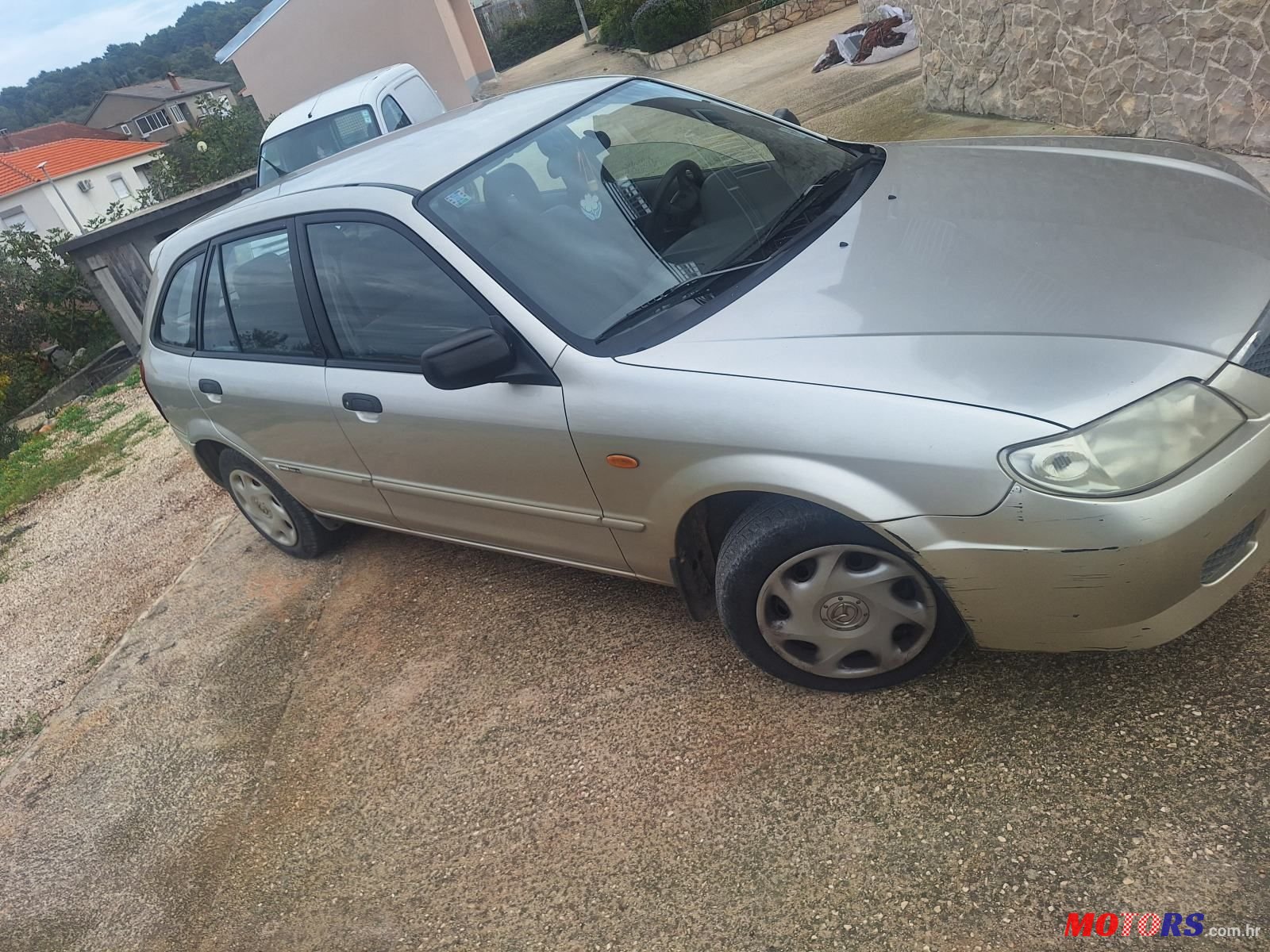 2003' Mazda 323 Osobno Vozilo photo #6