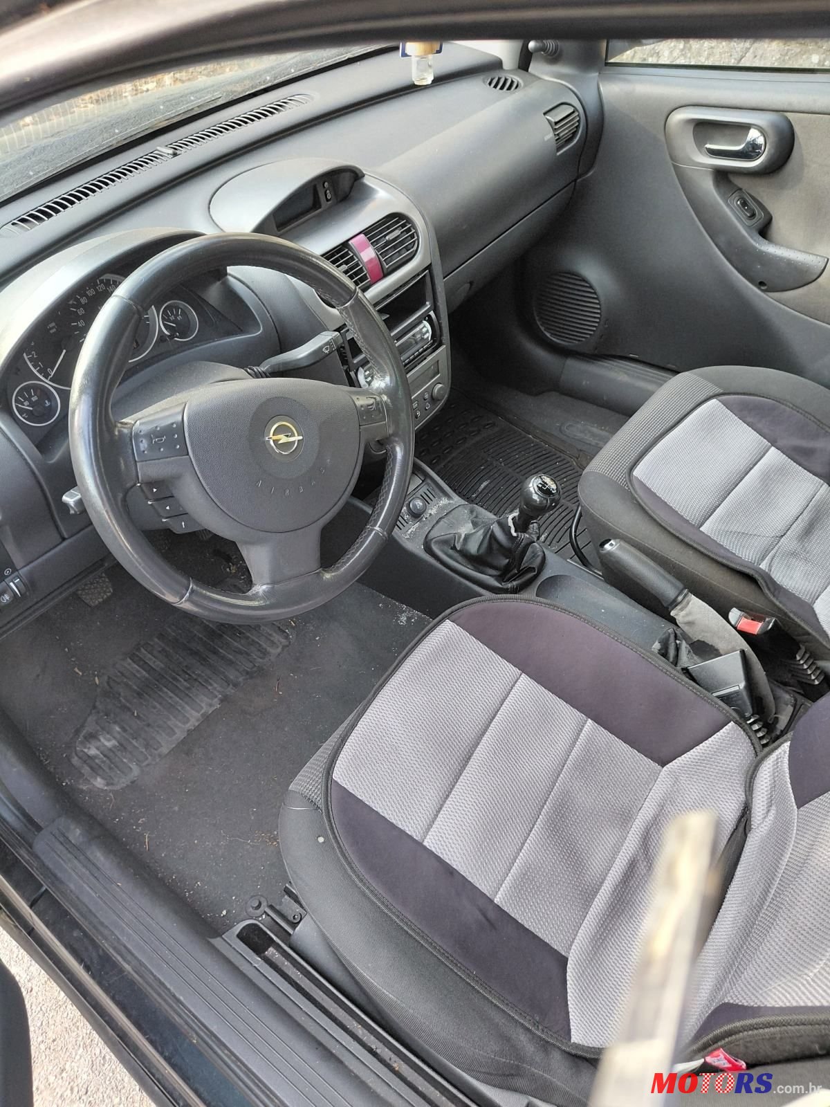 2004' Opel Corsa 1,2 16V photo #4