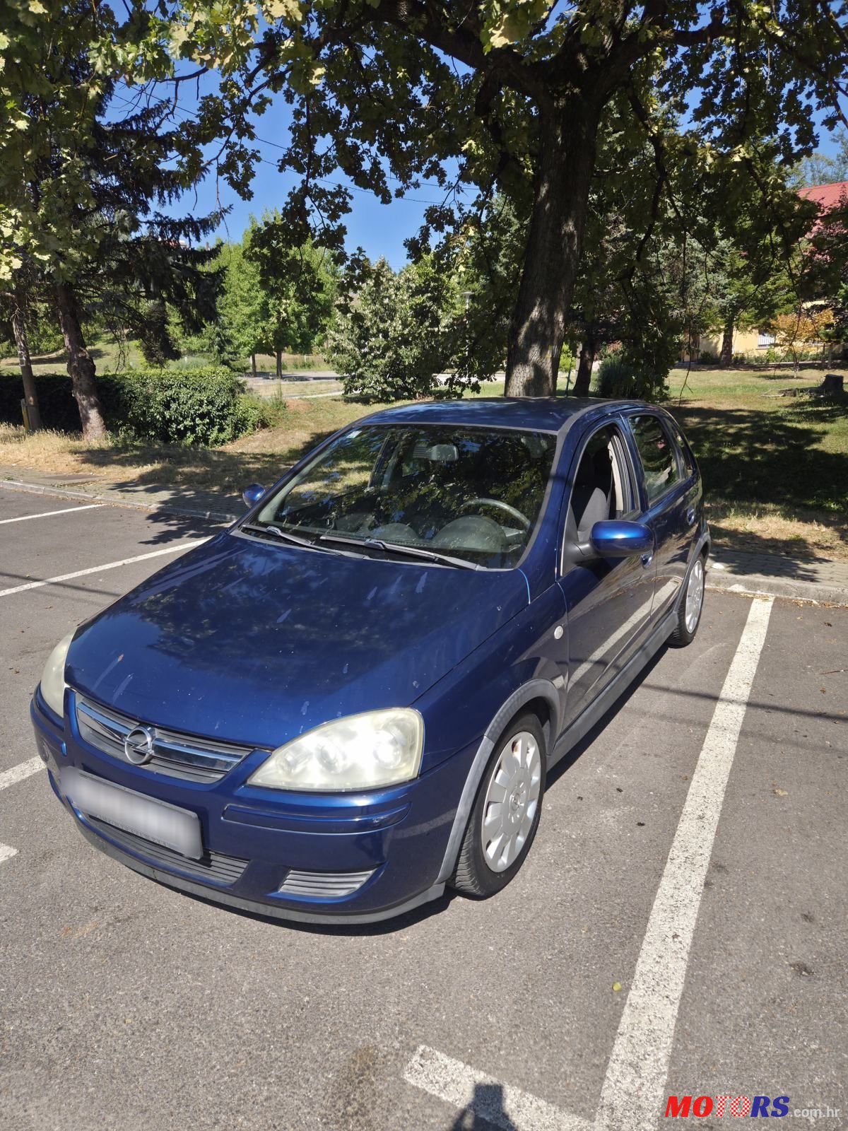 2004' Opel Corsa 1,2 16V photo #1