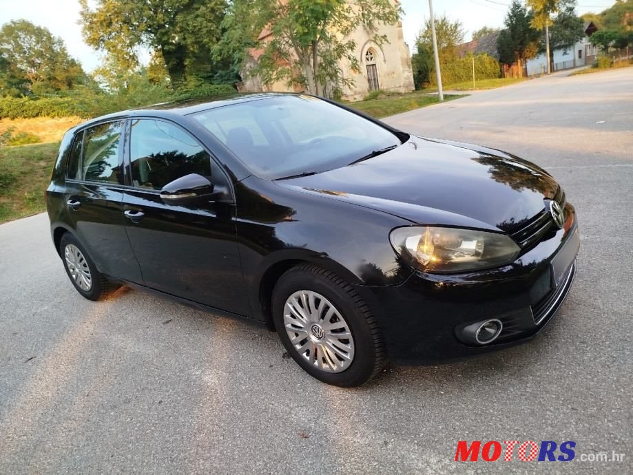 2009' Volkswagen Golf VI 1,4 photo #6