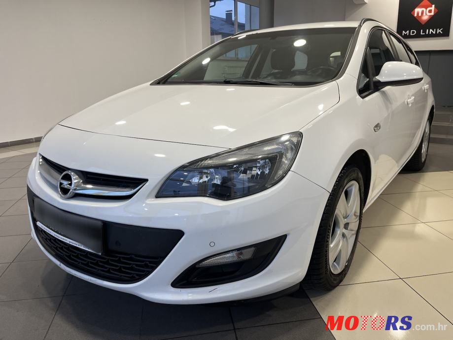 2014' Opel Astra Karavan photo #1