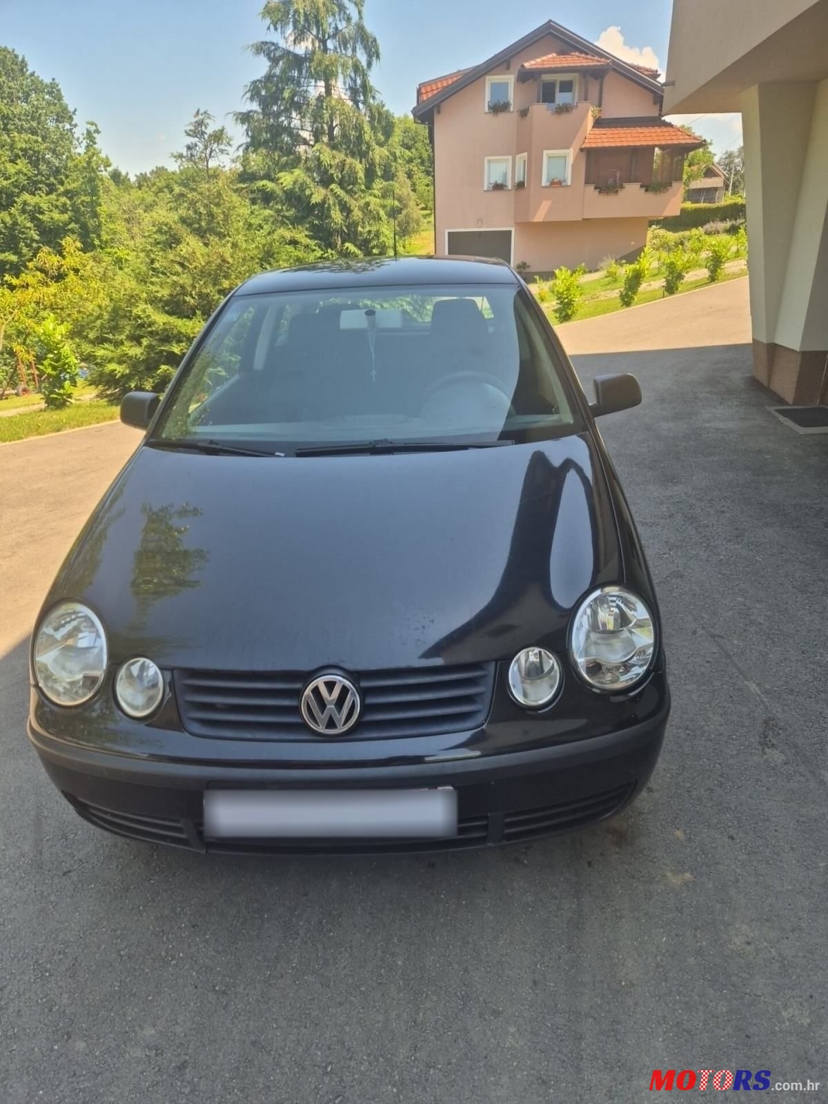 2002' Volkswagen Polo 1,4 photo #1