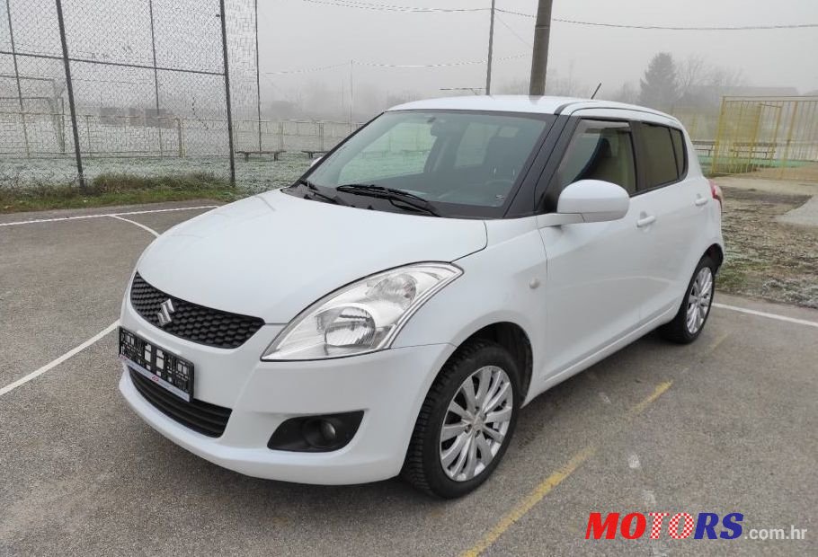 2011' Suzuki Swift 1,2 Se Ac photo #1