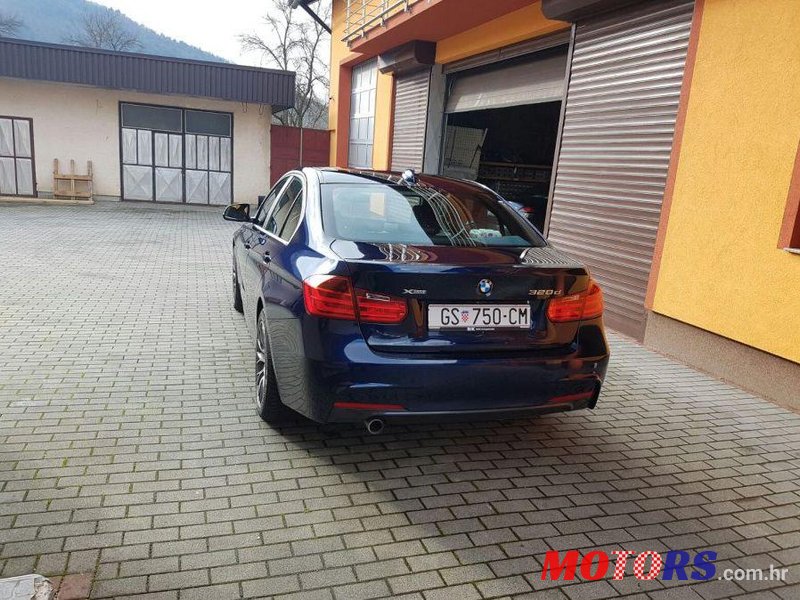 2014' BMW 3 Series 320Xd photo #1