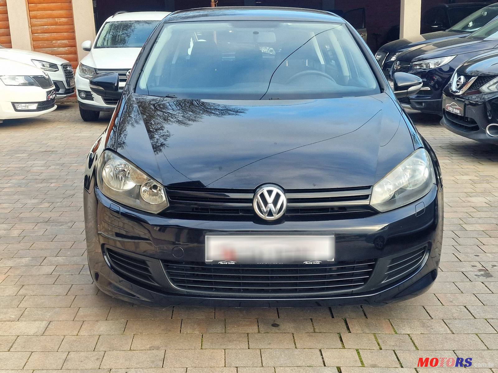 2011' Volkswagen Golf VI 1,6 Tdi photo #2