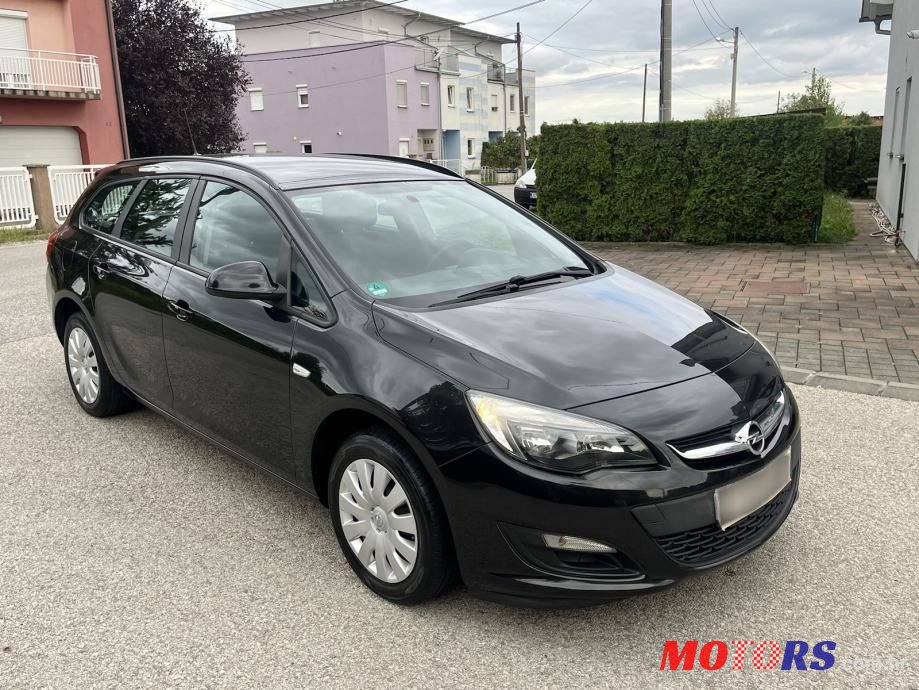 2014' Opel Astra Karavan photo #1