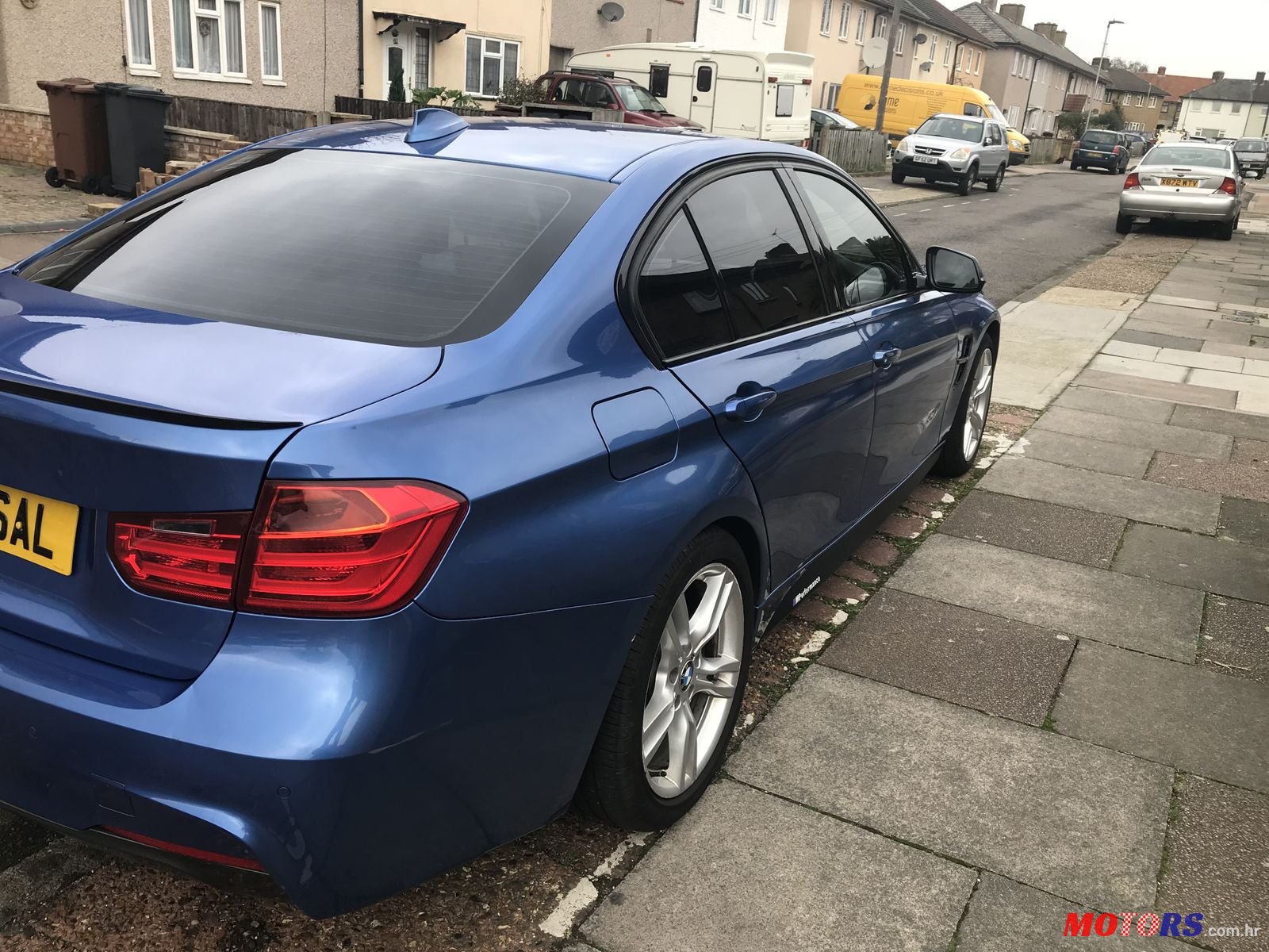 2012' BMW 3 Series M Sport with M3 wings photo #6
