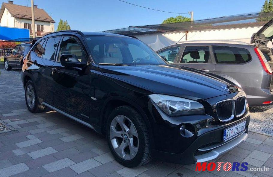 2011' BMW X1 Xdrive18D photo #1