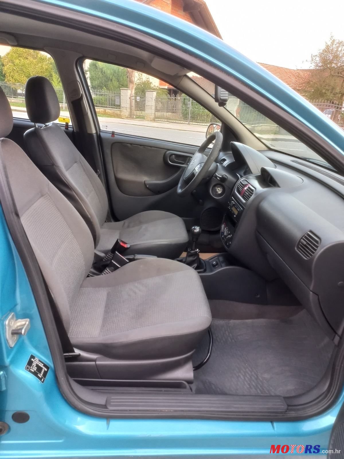 2003' Opel Corsa 1.0 photo #2