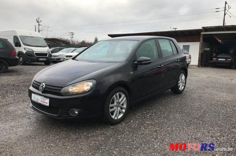 2010' Volkswagen Golf VI 1,6 Tdi photo #1