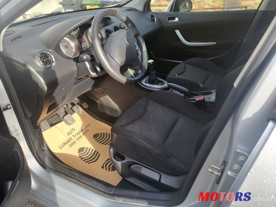 2011' Peugeot 308 Sw photo #6