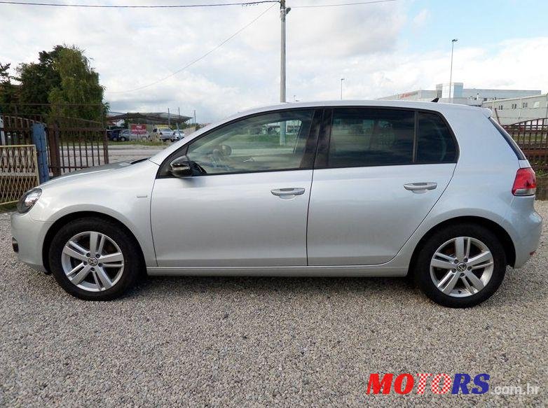 2012' Volkswagen Golf VI 1,6 Tdi photo #2