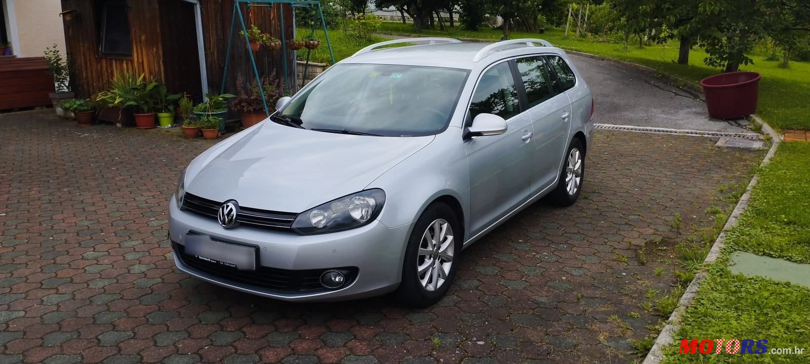 2012' Volkswagen Golf VI Variant photo #1
