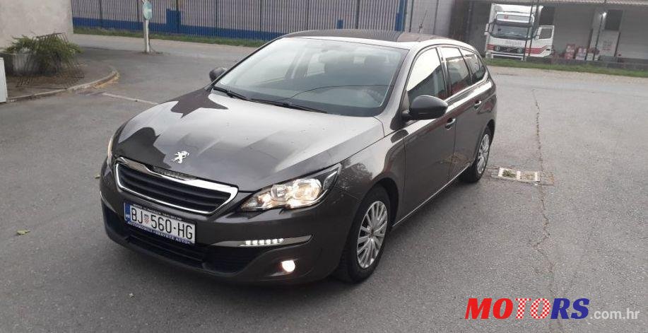 2015' Peugeot 308 Sw photo #1
