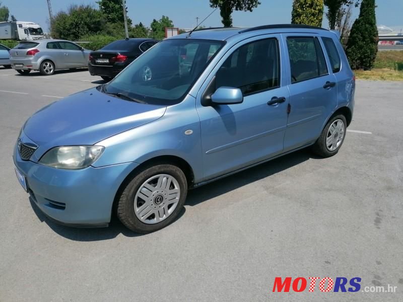 2004' Mazda 2 Cd68 Ce photo #1