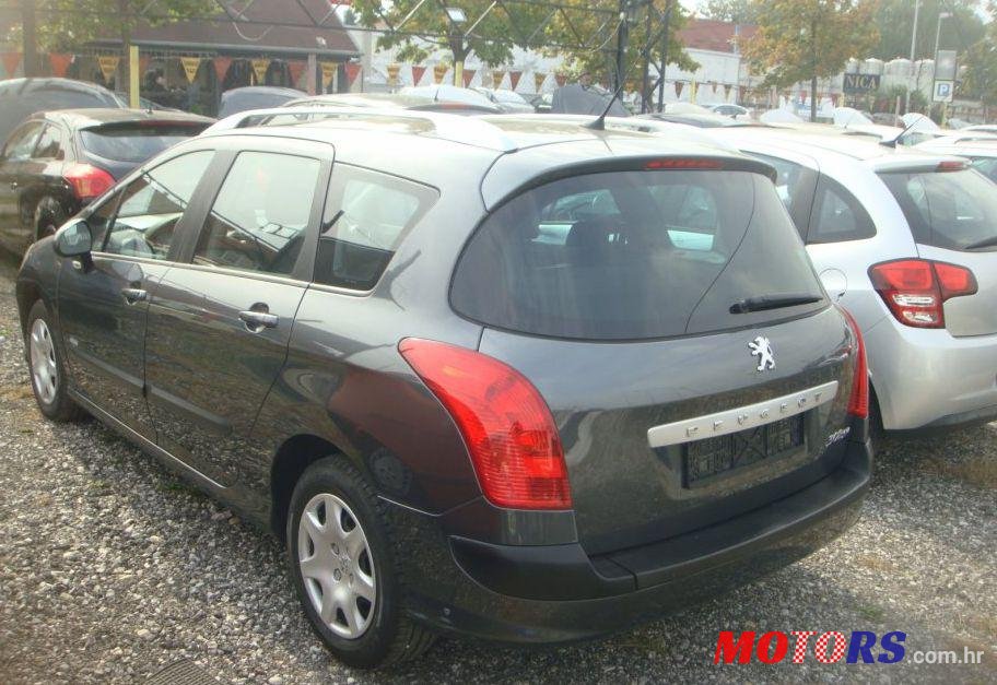 2009' Peugeot 308 Sw photo #1