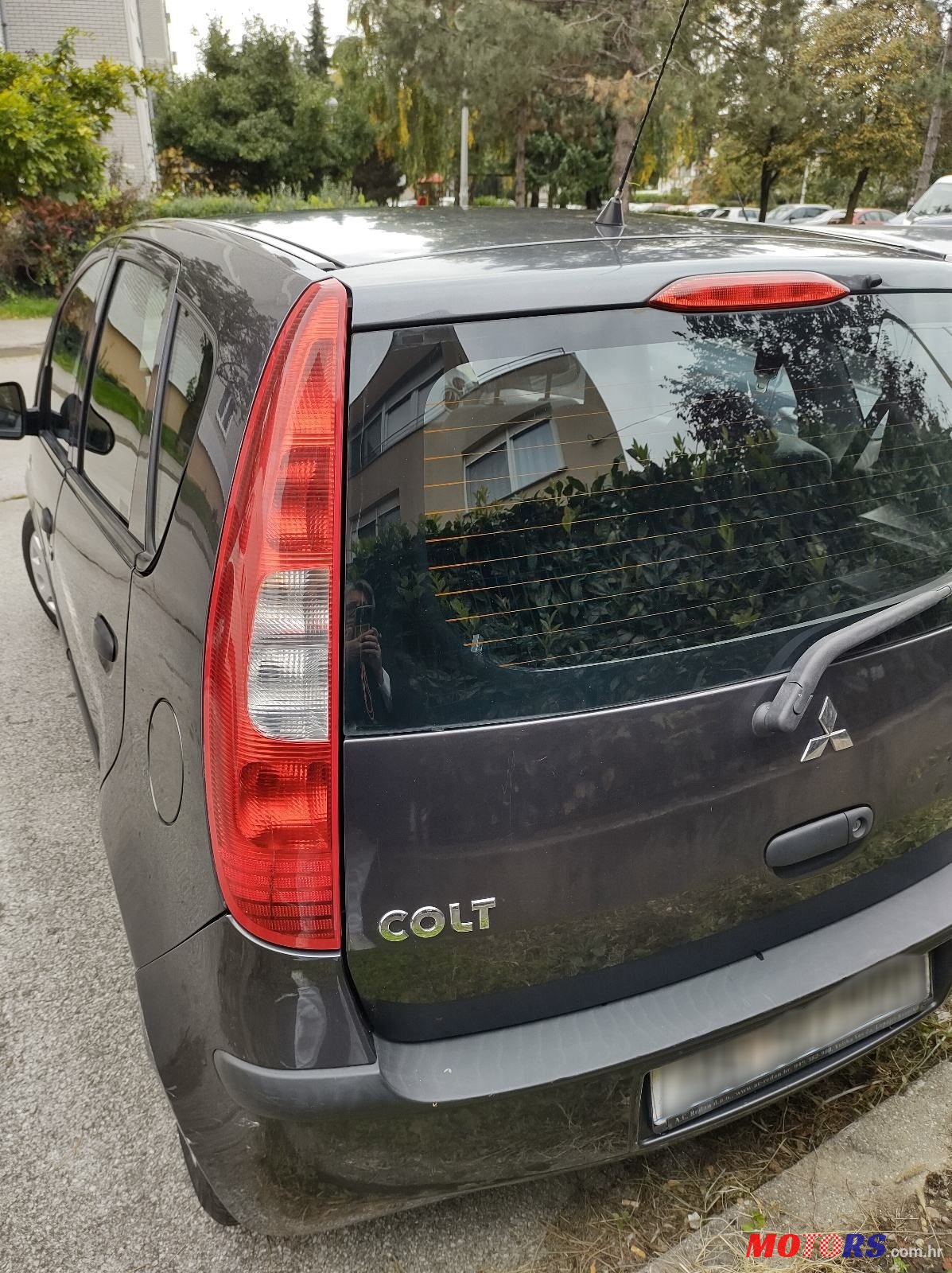 2004' Mitsubishi Colt 1,1 photo #4