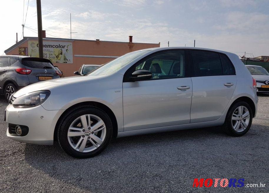 2012' Volkswagen Golf VI 1,6 Tdi photo #1