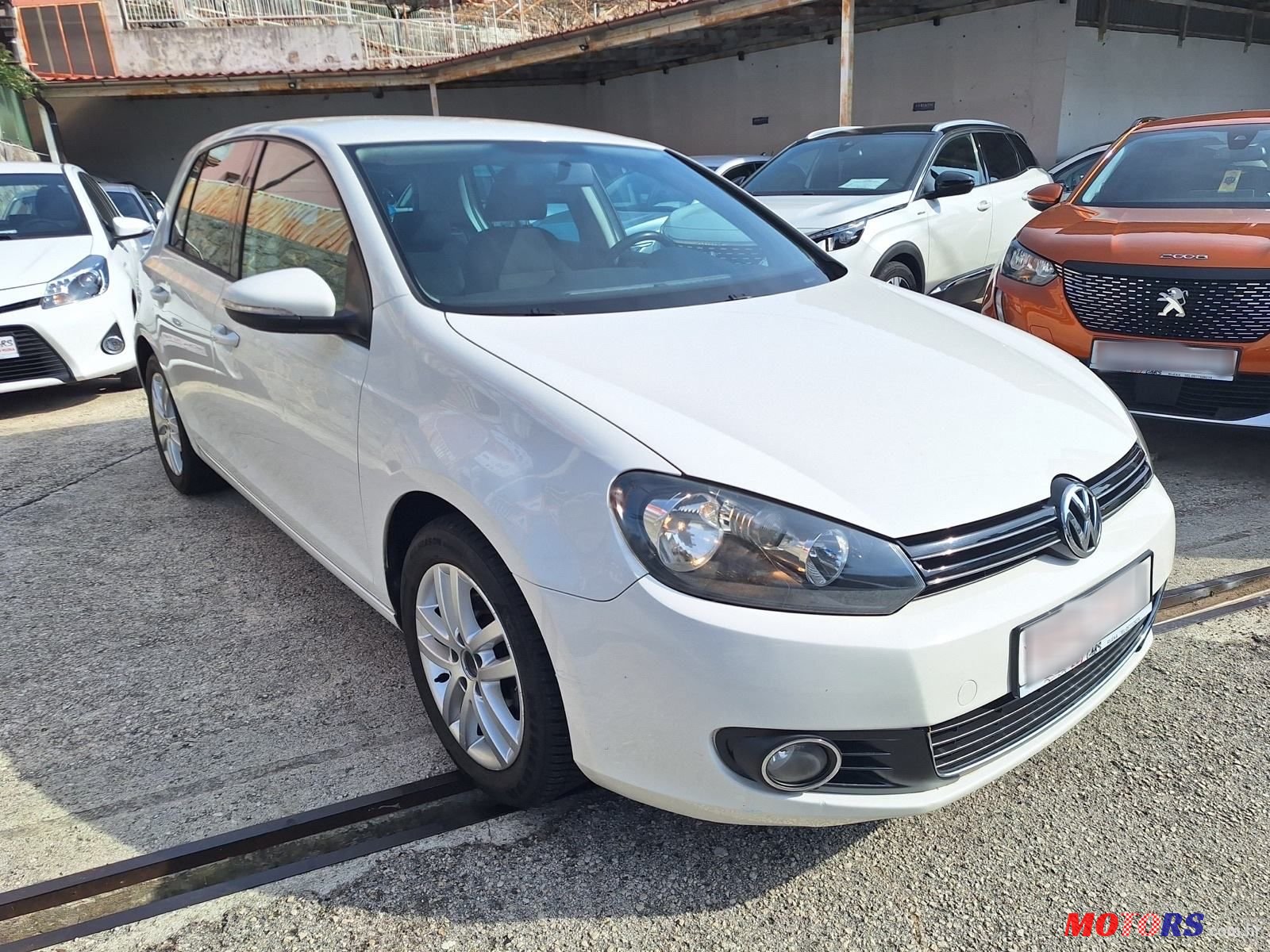 2011' Volkswagen Golf VI 1,6 Tdi photo #3