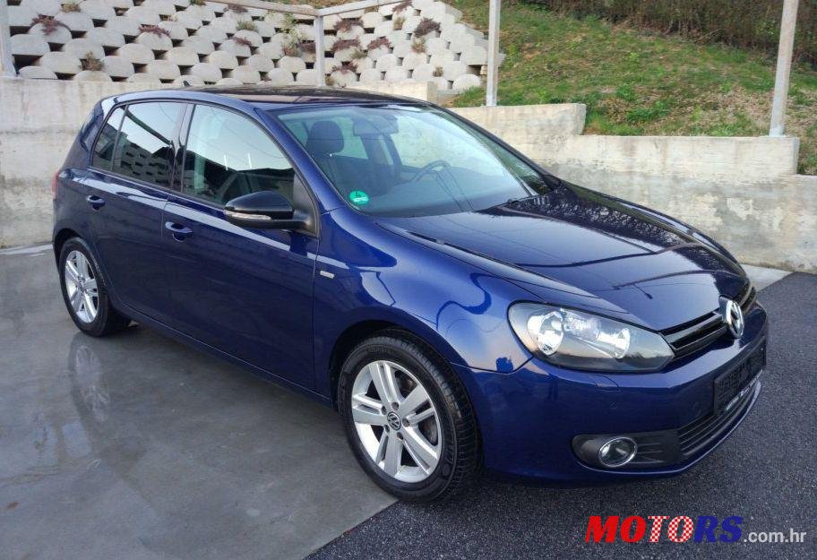 2012' Volkswagen Golf VI 1,6 Tdi photo #1