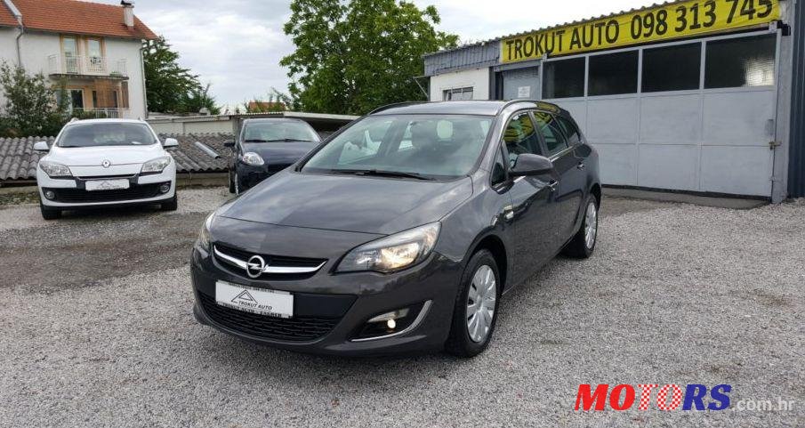 2013' Opel Astra Karavan photo #1