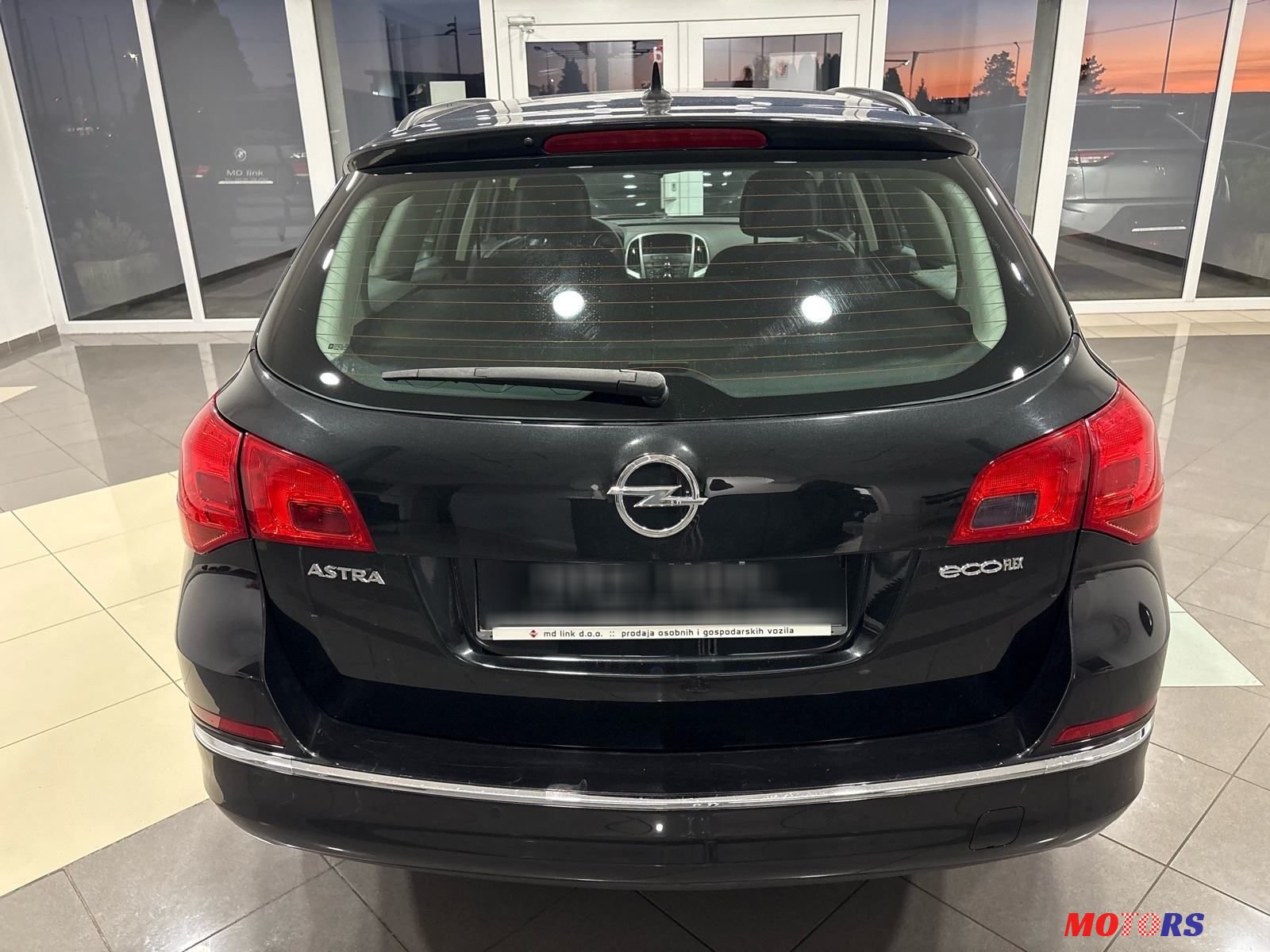 2013' Opel Astra Karavan photo #5