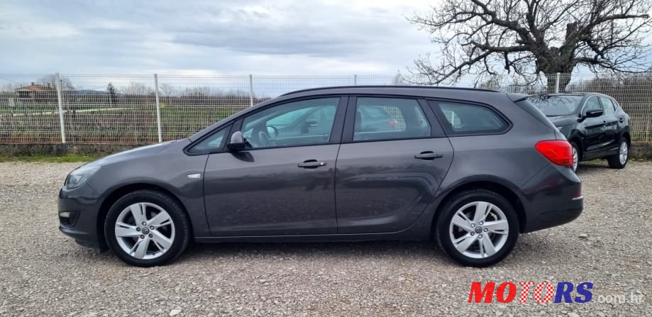 2014' Opel Astra Karavan photo #2