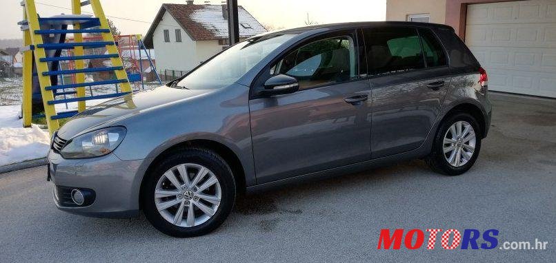 2012' Volkswagen Golf VI 1,6 Tdi photo #2