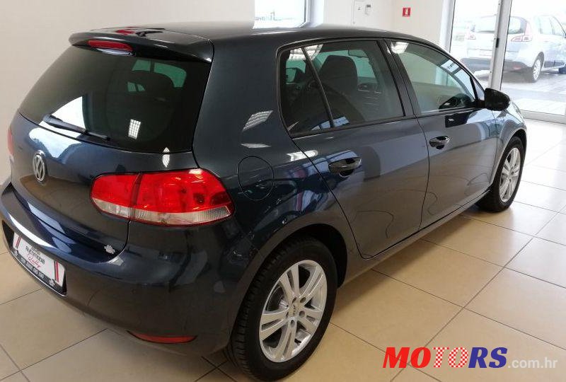 2011' Volkswagen Golf VI 1,6 Tdi photo #2