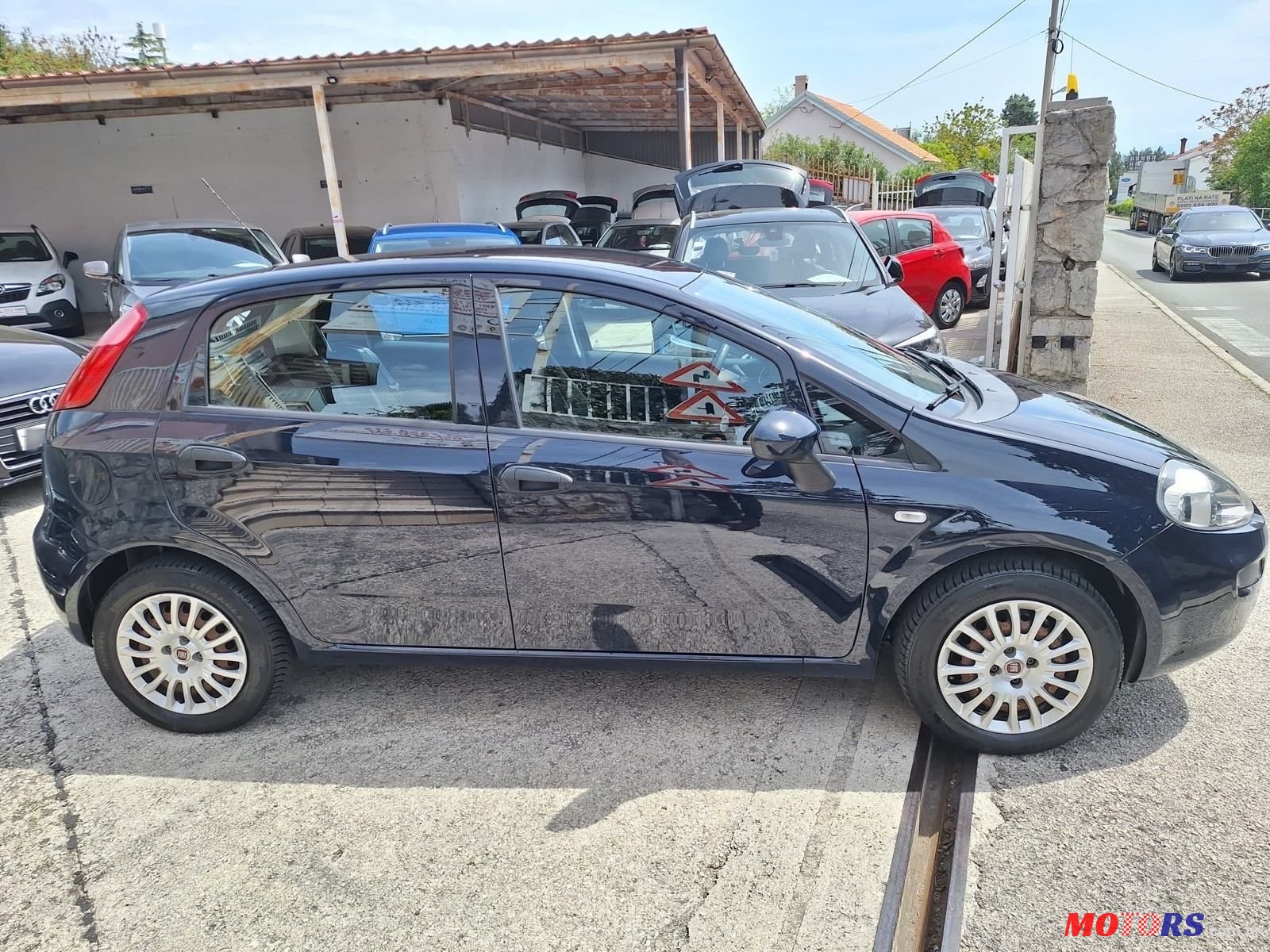 2015' Fiat Punto Evo 1.4 photo #6