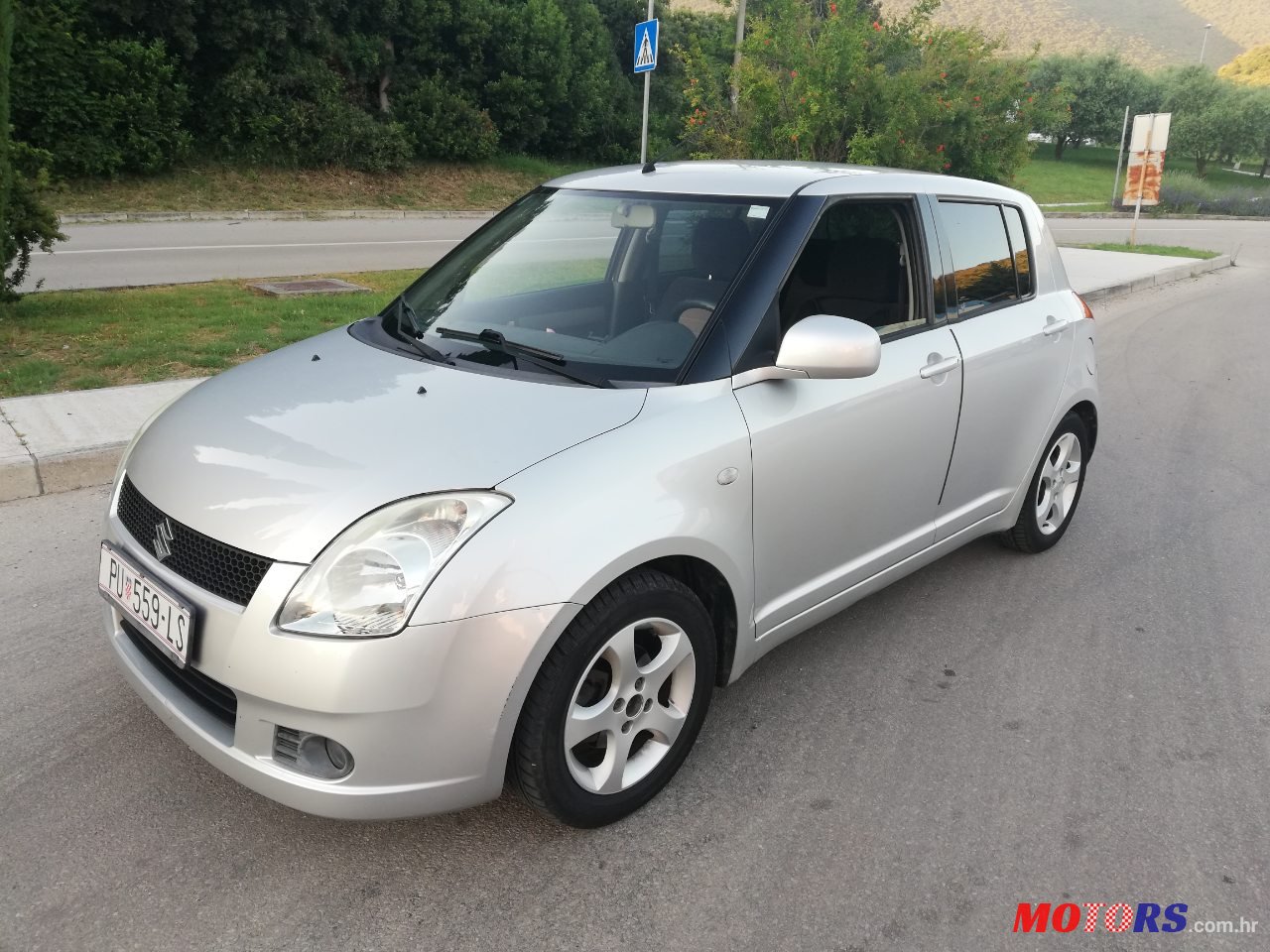2007' Suzuki Swift photo #2