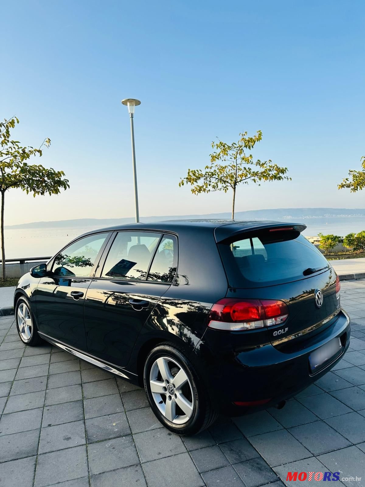 2012' Volkswagen Golf VI 1,6 Tdi photo #3