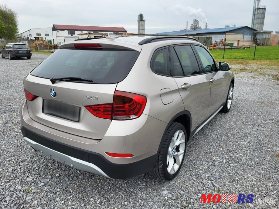 2014' BMW X1 Sdrive18D photo #5