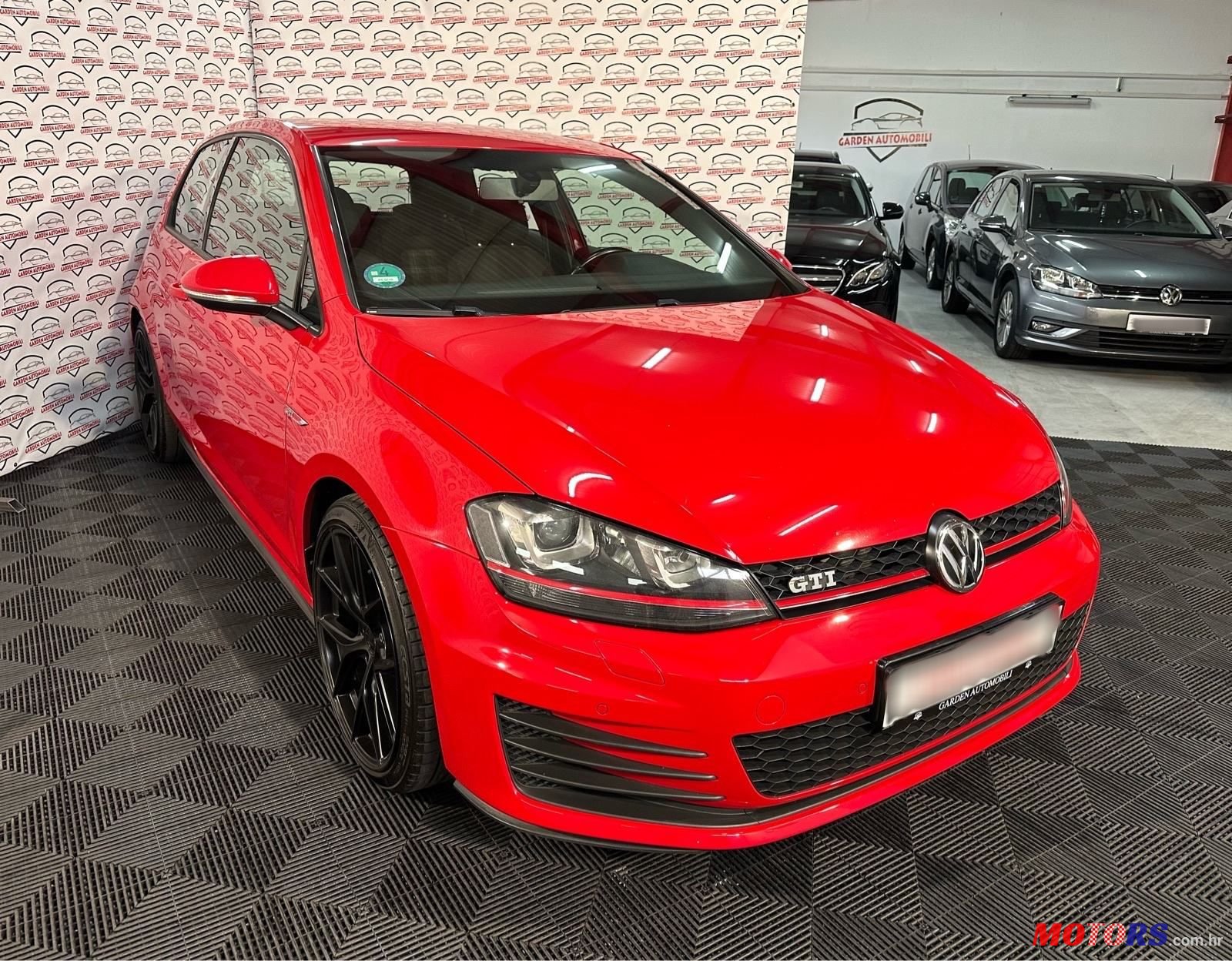 2013' Volkswagen Golf VII 2.0 Gti photo #3