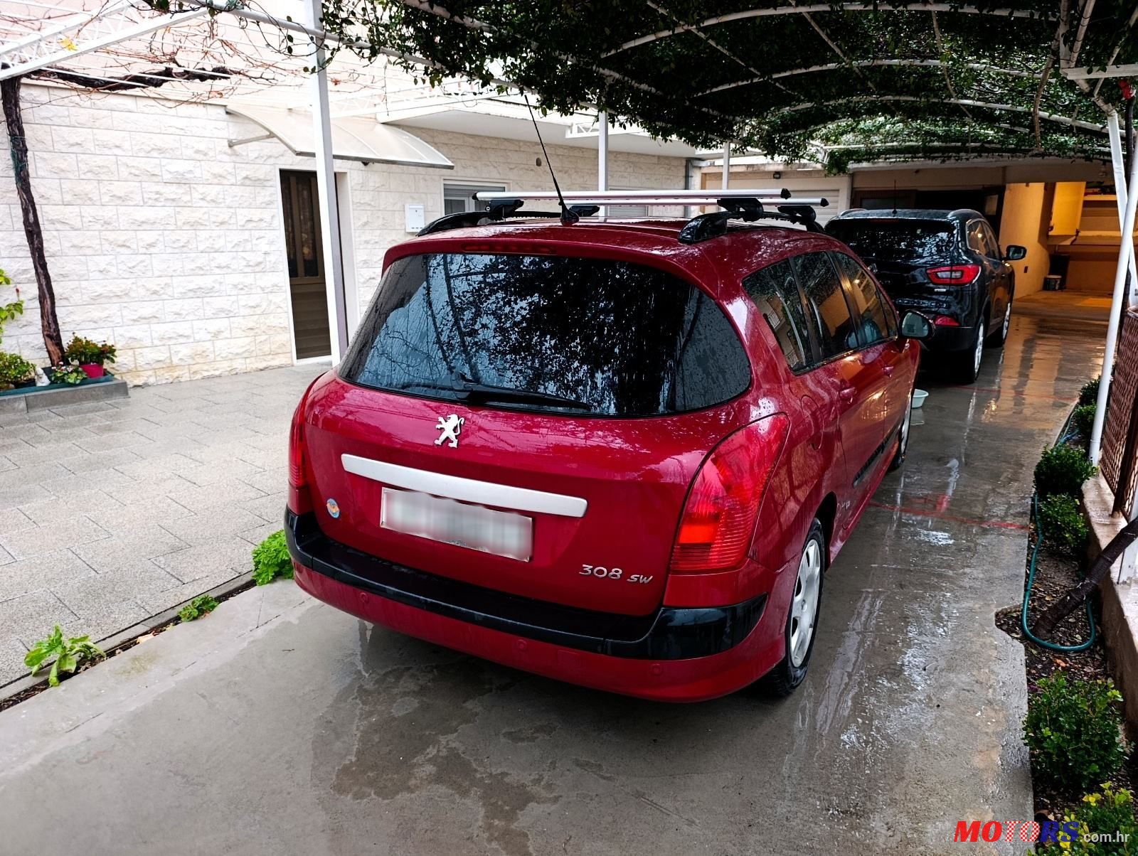 2009' Peugeot 308 Sw photo #1