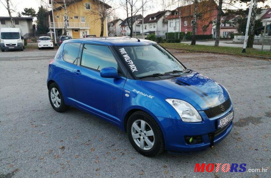 2009' Suzuki Swift 1,3 photo #1