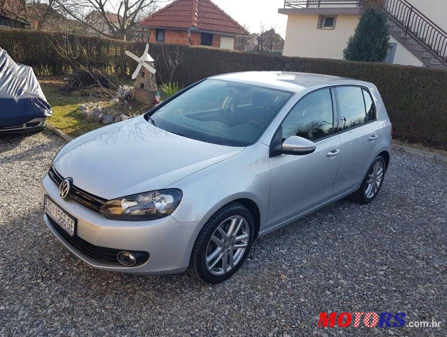 2012' Volkswagen Golf VI 1,6 Tdi photo #2