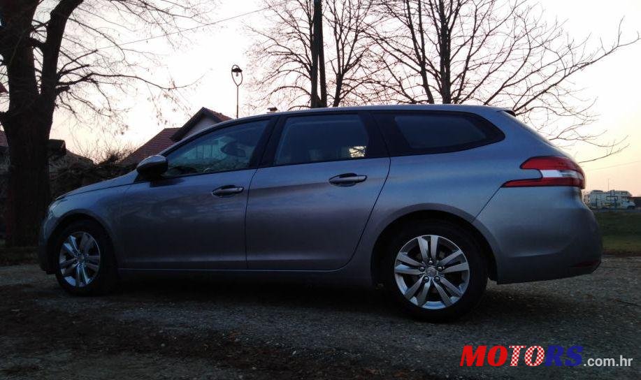 2015' Peugeot 308 Sw photo #1
