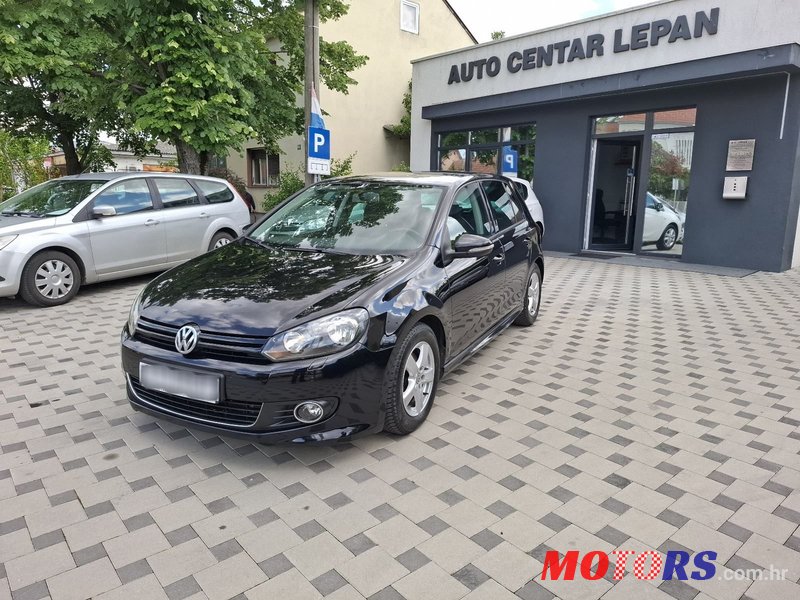 2011' Volkswagen Golf VI 1,6 Tdi photo #3