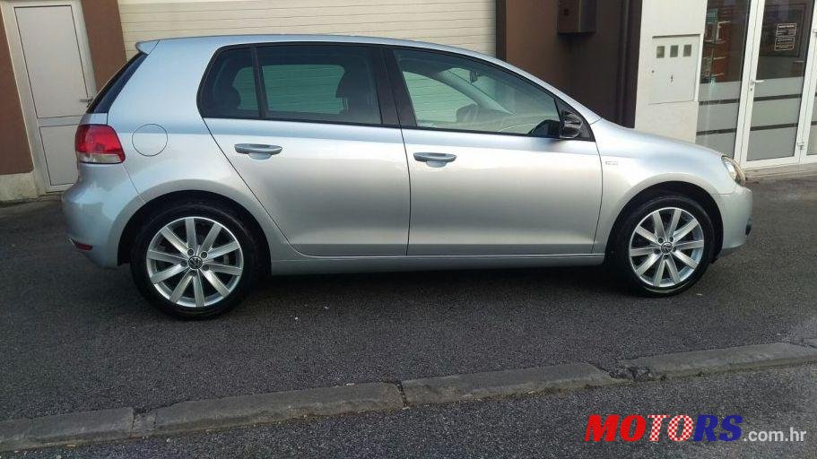 2012' Volkswagen Golf VI 1,6 TDI photo #1