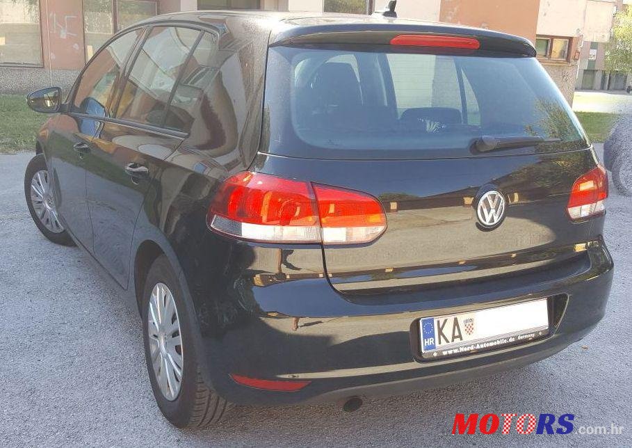 2011' Volkswagen Golf VI 1,6 Tdi photo #1