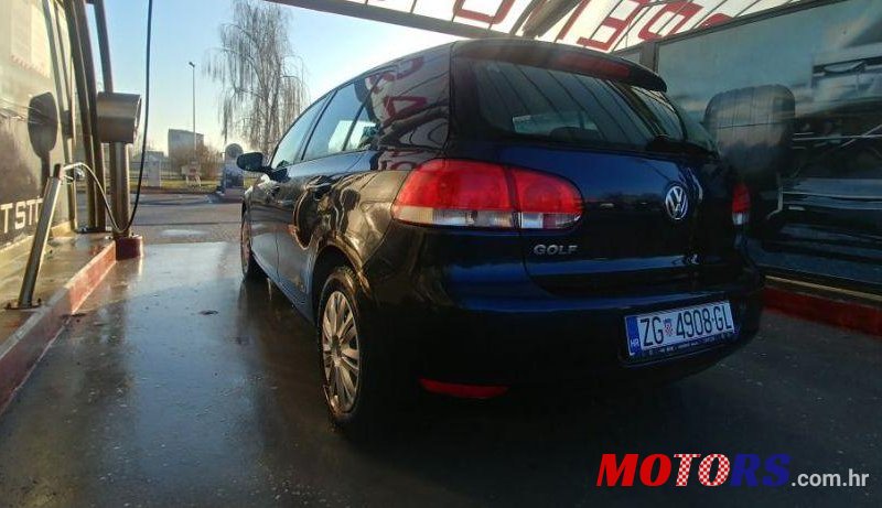 2009' Volkswagen Golf VI 1,6 photo #2