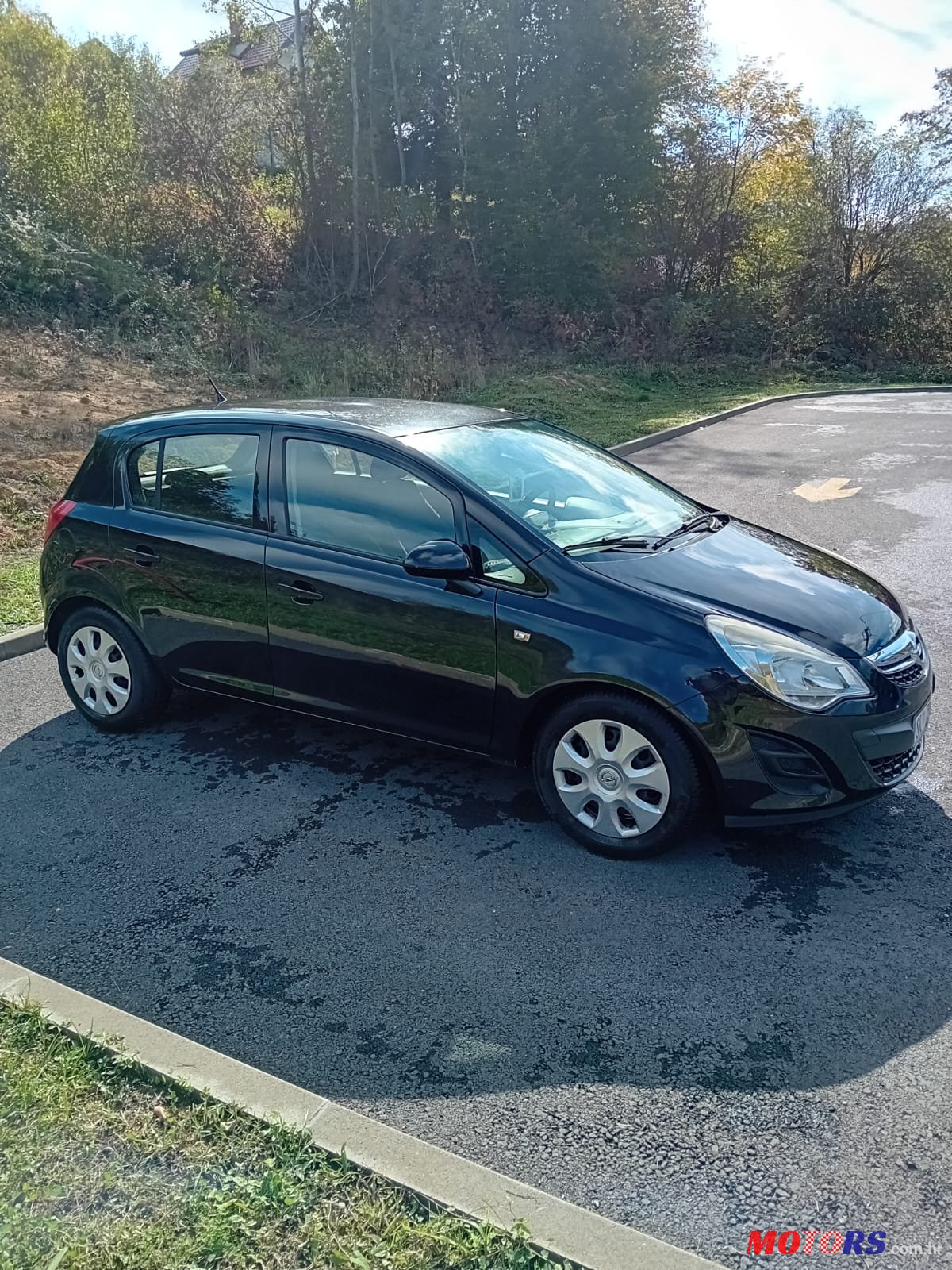 2011' Opel Corsa photo #1