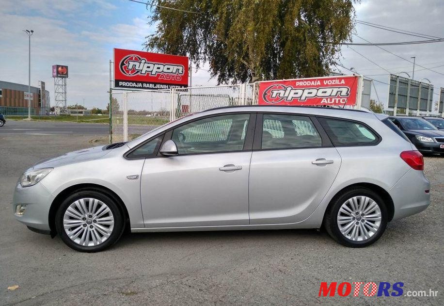 2011' Opel Astra Karavan Sports photo #1