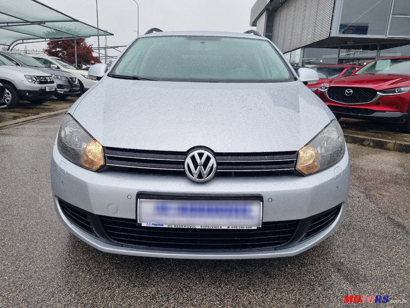 2011' Volkswagen Golf VI 1,6 Tdi photo #2