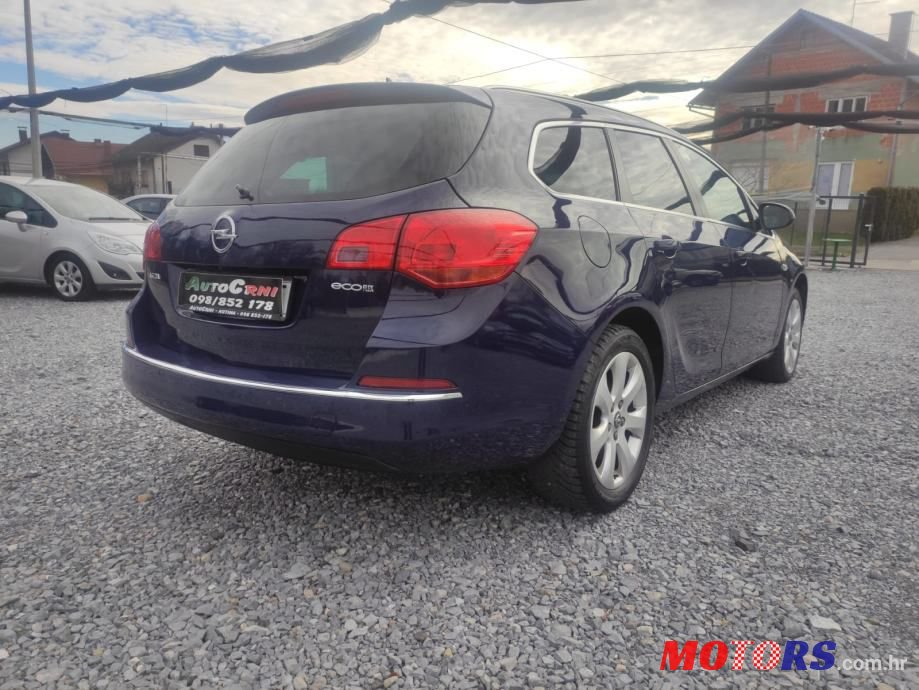 2015' Opel Astra Karavan photo #5