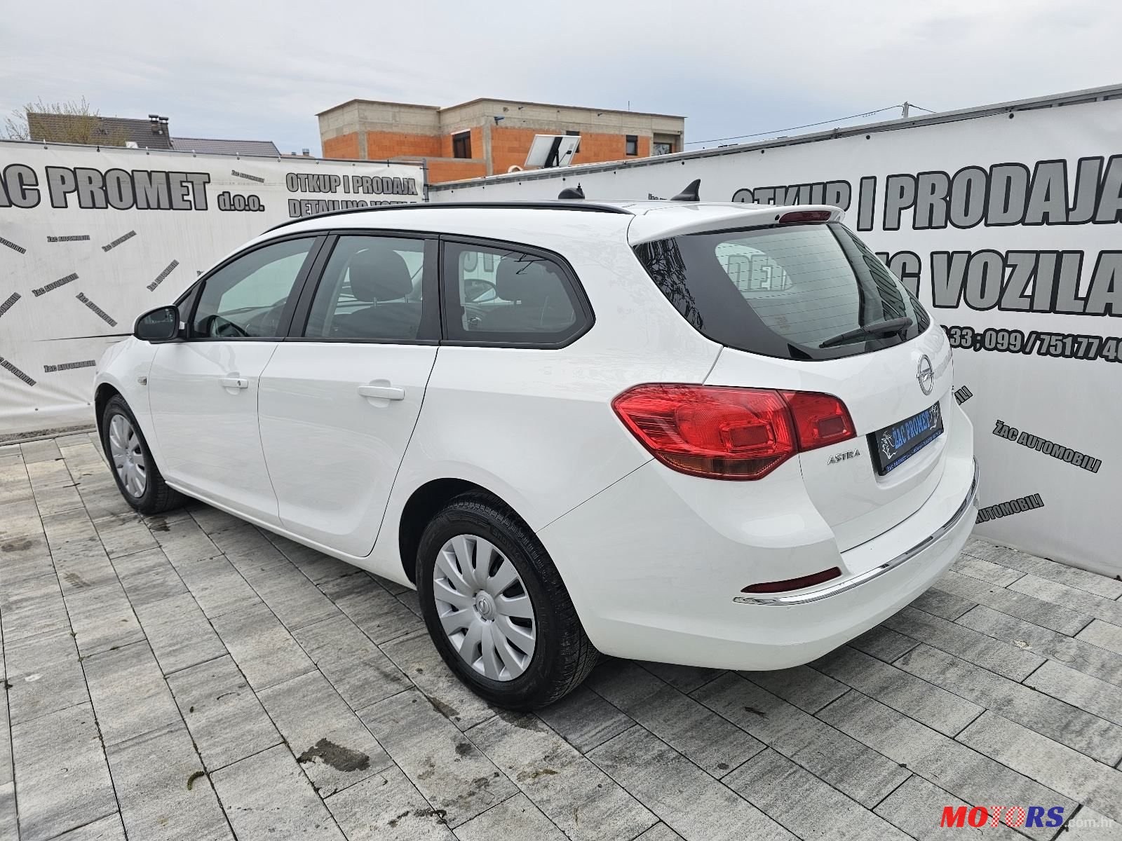 2015' Opel Astra Karavan photo #3