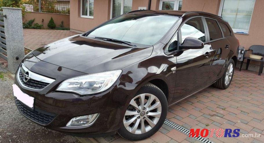 2012' Opel Astra Karavan photo #1